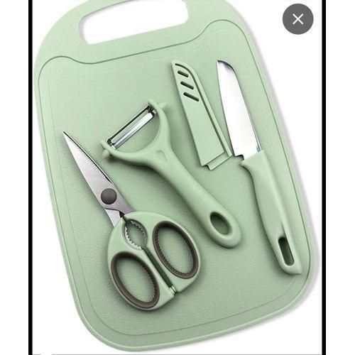 Kitchen set of scissors, peeler, small knife and chopping board