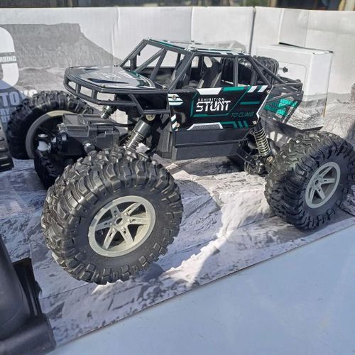 Rechargeable Toy Car 4WD RC Rock Crawler Off Road Truck for Kids 4+ Years with Large Rubber Tires and Responsive Remote Control