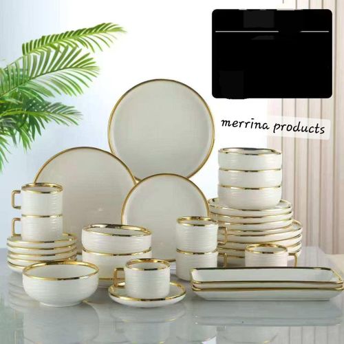 The Elegant 32-Piece Complete Dinner Set with Platters is a versatile and stylish dining collection designed to enhance your table presentation. It includes 6 dinner plates, 6 side plates, 6 mugs, 6 soup bowls, 6 saucers, and 2 serving platters.