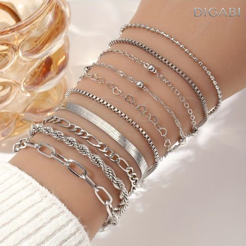 A Set Of 10 Pieces Of Womens Stackable Bracelets Featuring A Simple And Classic Twisted Snake Chain Design Suitable For Daily Wear Or As A Gift For Holidays