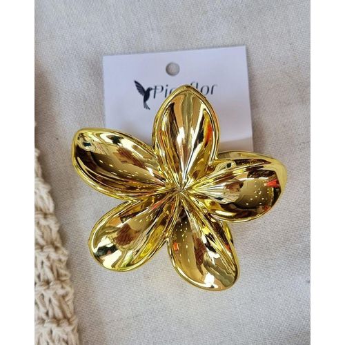 Gold hawaaian claw clip