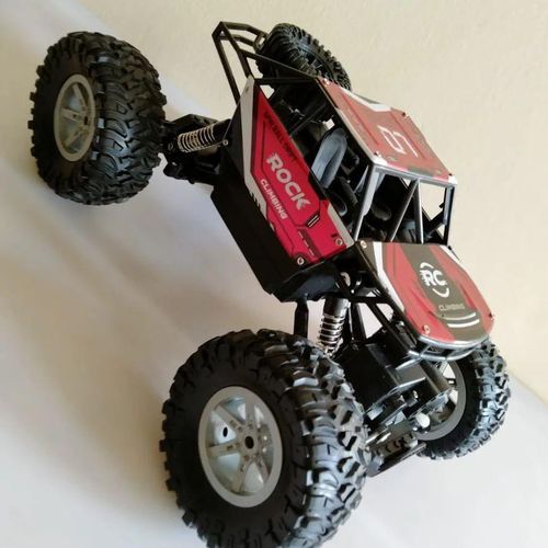 4WD Crawler RC Truck with Heavy Duty Shock Absorbers Large Tires and Responsive Remote Control Ages 8+ Years