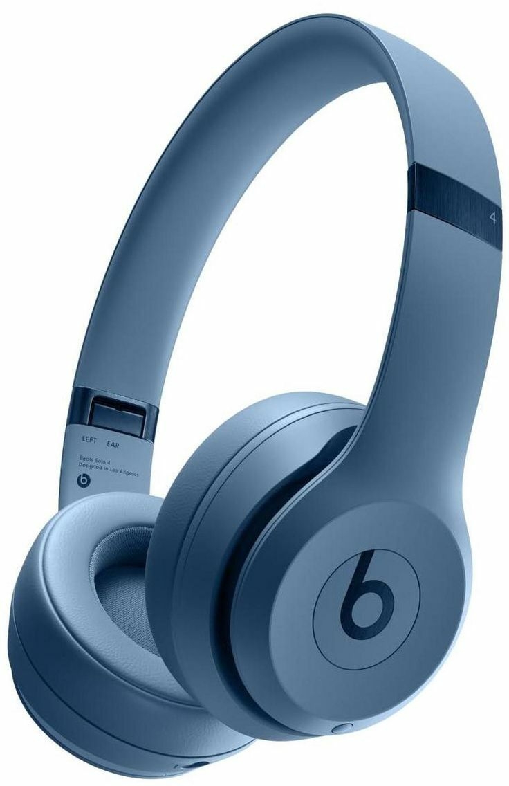 This may contain: the beats on ear headphones are blue
