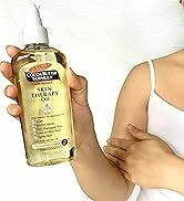 Palmers Skin therapy body oil in hand
