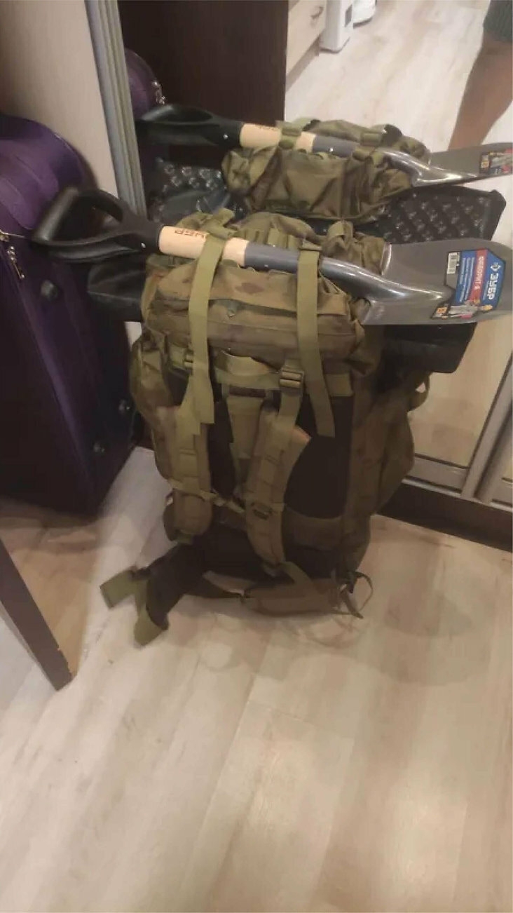 Large waterproof camping & hiking backpack with Molle system for travel and military use.