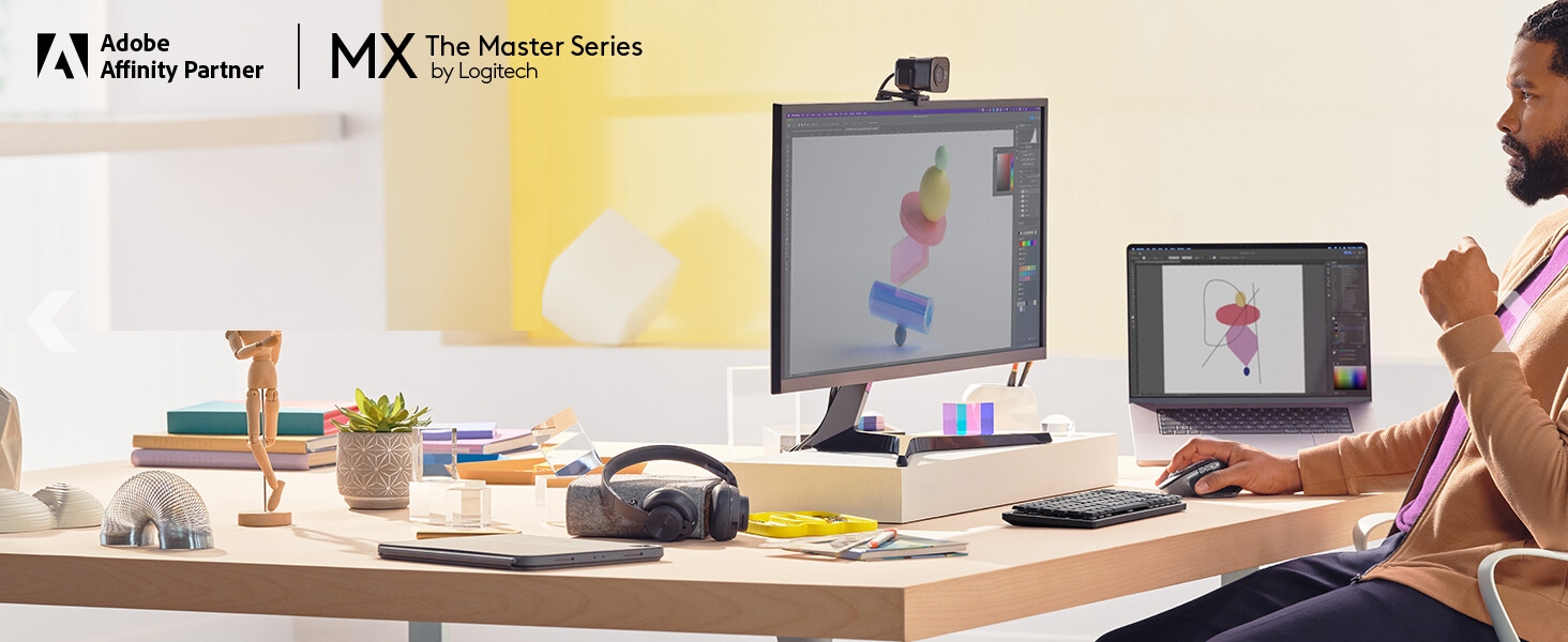 A man working on a computer using MX Master 3S for Mac