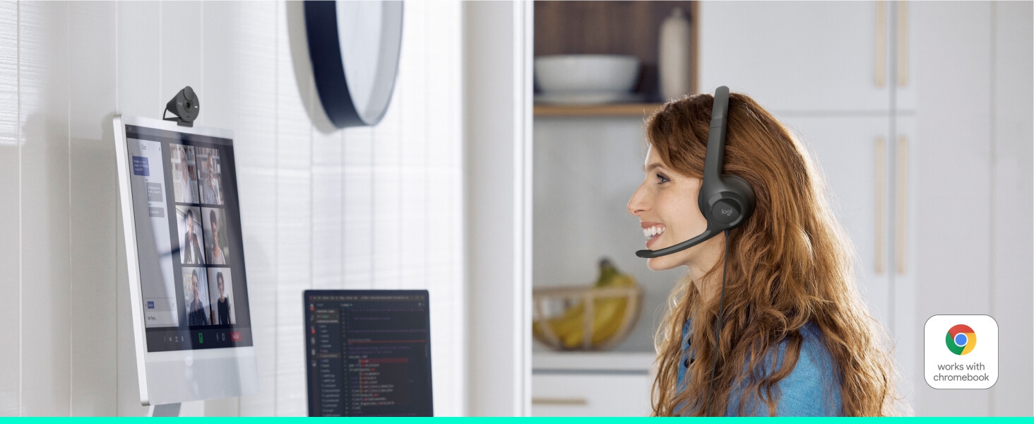 a woman having a video call using h391 wired stereo black headset with noise-cancelling microphone