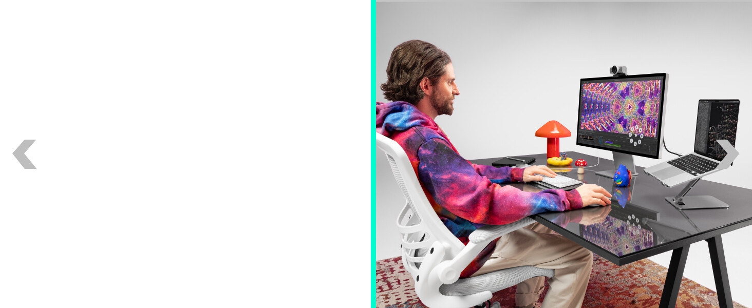 a man working on a computer using mx master 4 for mac ergonomic wireless mouse