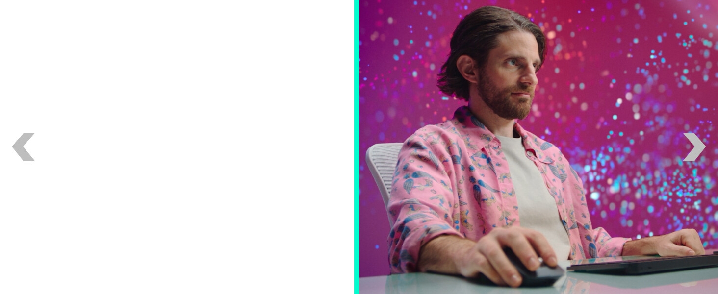 a man working on a computer using mx master 4 for mac ergonomic wireless mouse