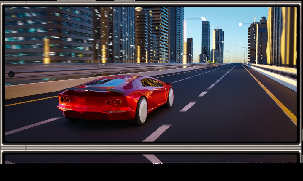 Image of a red sports car on a road.