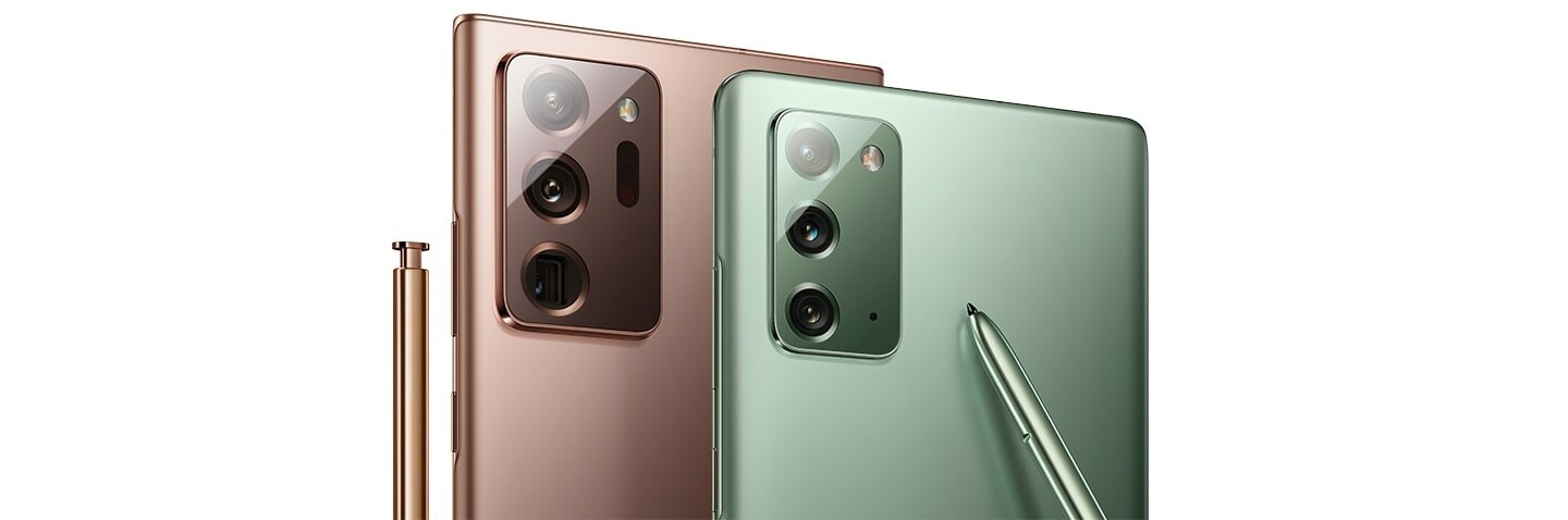 The upper halves of Galaxy Note20 Ultra in Mystic Bronze and Galaxy Note20 in Mystic Green, seen at an angle. Each phone has its matching S Pen leaning against it.