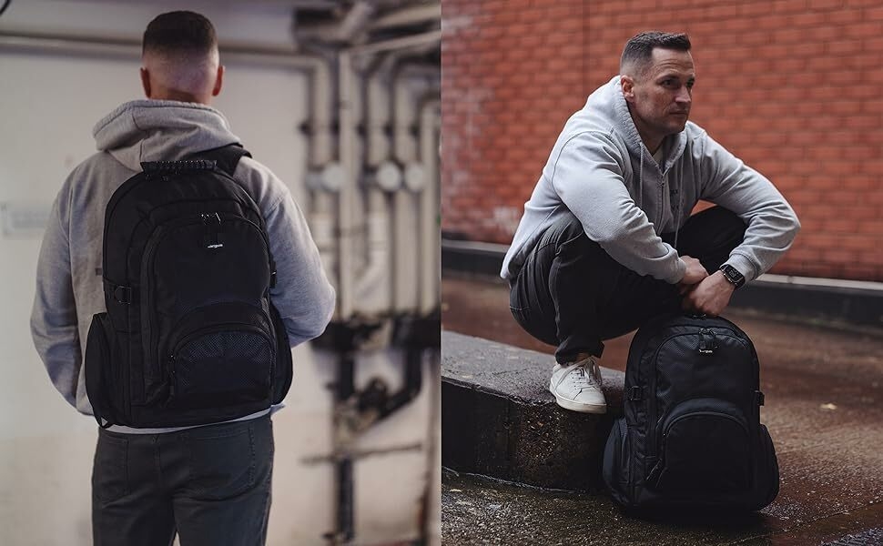 Man wearing black targus laptop backpack in urban setting