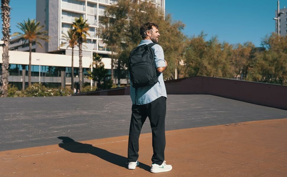 Targus laptop backpack on man outside commuting