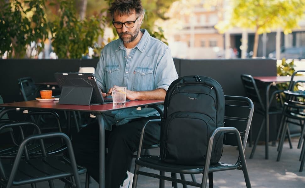 targus laptop backpack black on chair at cafe remote working