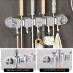 The Non slip wall Mounted mop holder