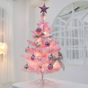 Mini table top Christmas tree with decorations and lights 