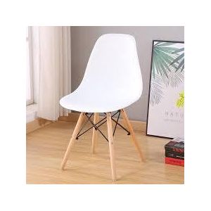 White ergonomic, molded polypropylene Eames-style plastic dining chairs
