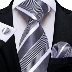 Black,white and silver striped necktie with cufflinks and pocket square 