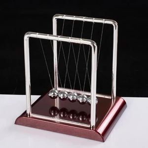Newtons pendulum cradle balance steel balls.