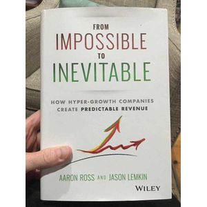 From Impossible To Inevitable: How Hyper-Growth Companies Create Predictable Revenue Book by Aaron Ross and Jason Lemkin
