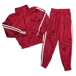A maroon tracksuit with two white stripes in sizes 26 to 38