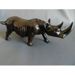 Rhino Carving ( 12 inches L, 5 inches W, 5.5 inches H )- With its alluring ebony hue and intricate details, this carving adds an element of cultural significance and natural beauty to any room