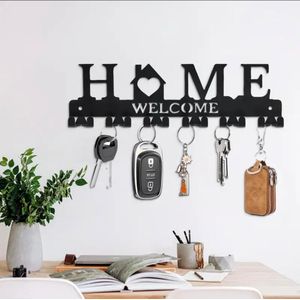 *Black metal wall-mounted key holder*