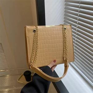 beige sling bag