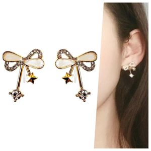 Ribbon Shaped Beige Crystal Rhinetone Bow Tie Invisible Clip On Earrings Stud