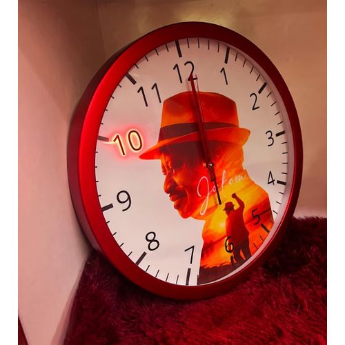 product_image_name-Redbubble-Decorative Raila Odinga wall clock with "Jakom" lettering – 40cm Black frame-3
