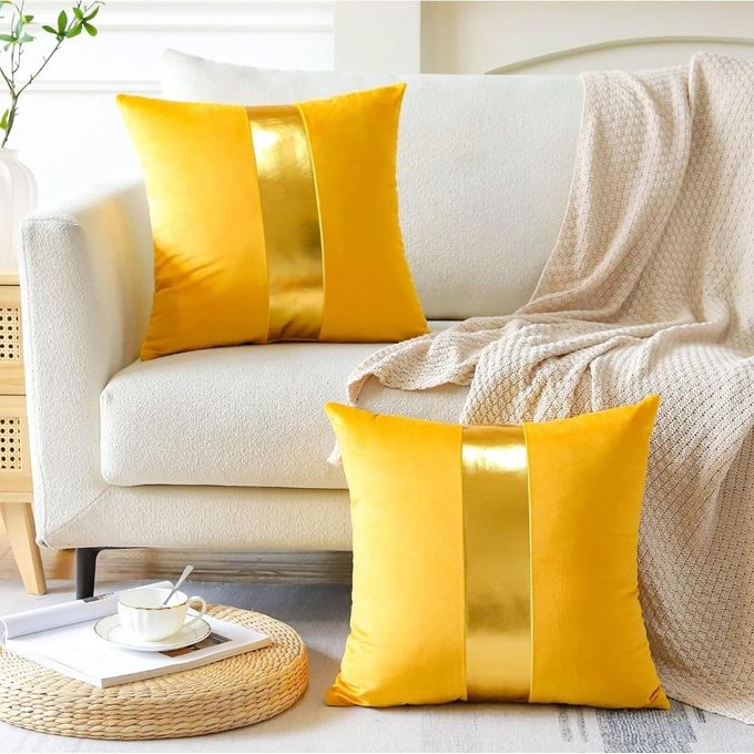 beige and gold throw pillows